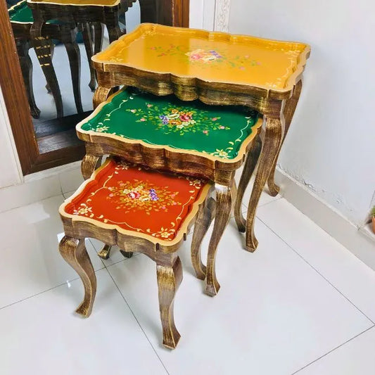 Harmony Hues wooden nesting table set with hand-painted floral designs, crafted from Kikar wood and MDF for a classic and vibrant home accent.