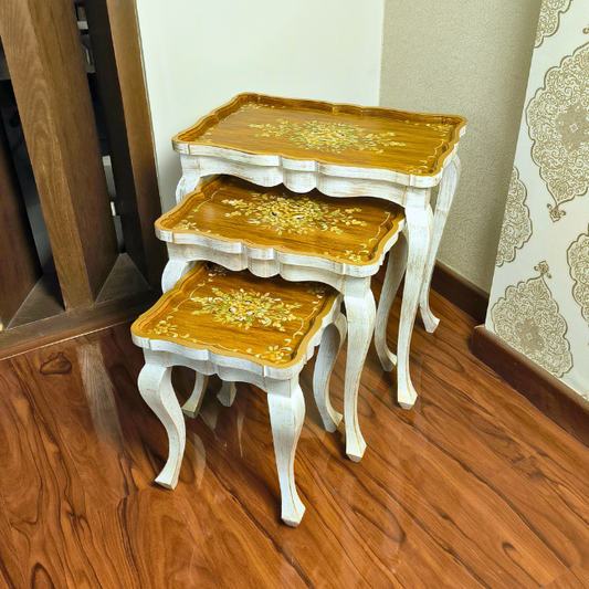 Handcrafted Rustic Ramble wooden nesting tables, made with Kikar wood and MDF, featuring a warm wood finish with gold floral detailing